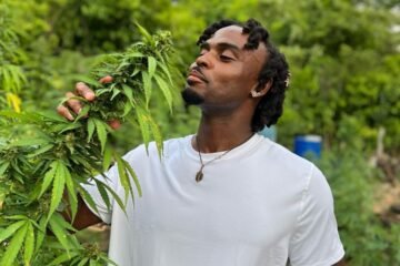 Tourist at Weed Tour Farm in Jamaica with Collins Adventure Tours