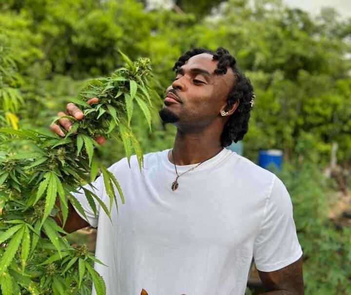 Tourist at Weed Tour Farm in Jamaica with Collins Adventure Tours